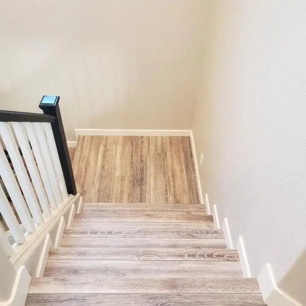 Staircase landing with plank treads