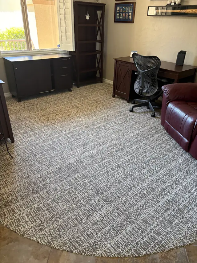 Round patterned carpet laid in a Las Vegas home office, installed by Affordable Flooring