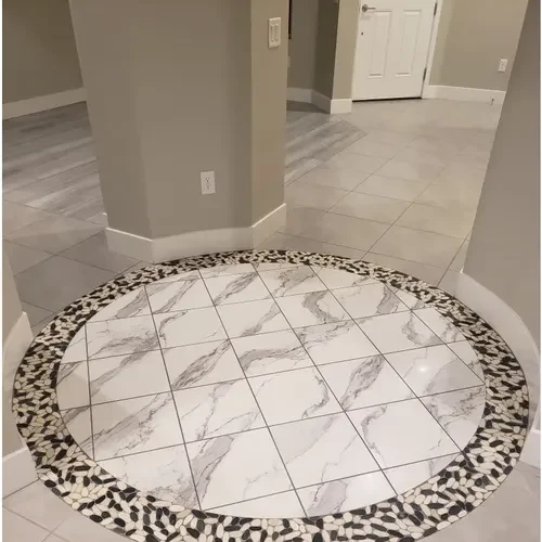 Tile floor with a marble medallion at its center
