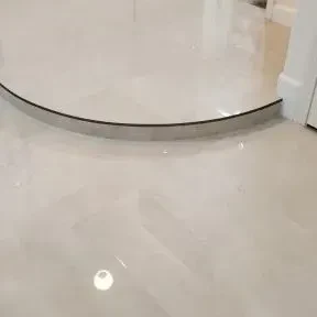 Polished large-format porcelain floor